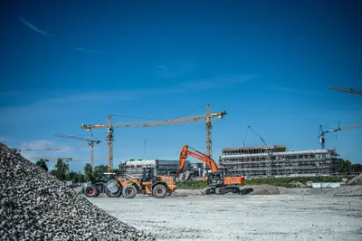 Equipment in use for excavation pit construction in Kirchheim bei Muenchen
